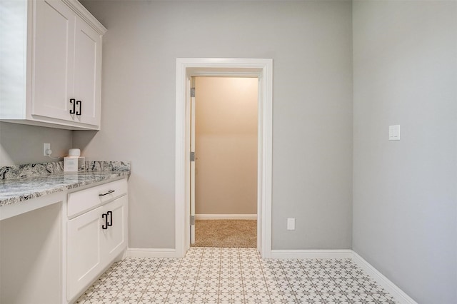 2161 Eagles Ridge Dr, Weatherford, TX 76087 - clothes washing area with baseboards and light floors