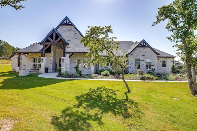 2161 Eagles Ridge Dr, Weatherford, TX 76087 - view of front of home featuring stone siding and a front yard