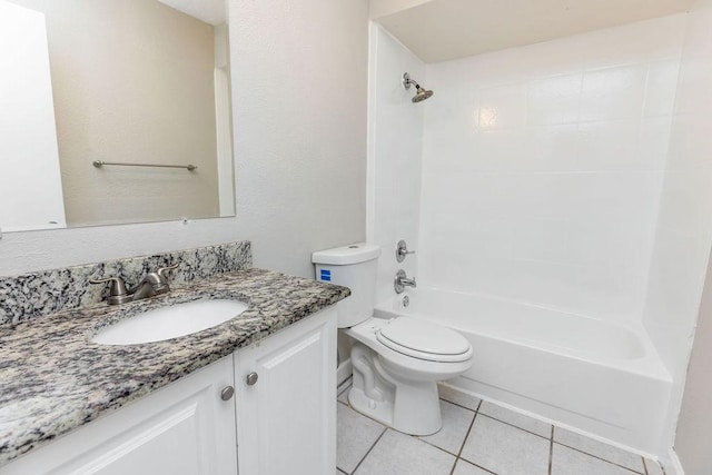 full bathroom featuring bathtub / shower combination, tile patterned floors, vanity, and toilet