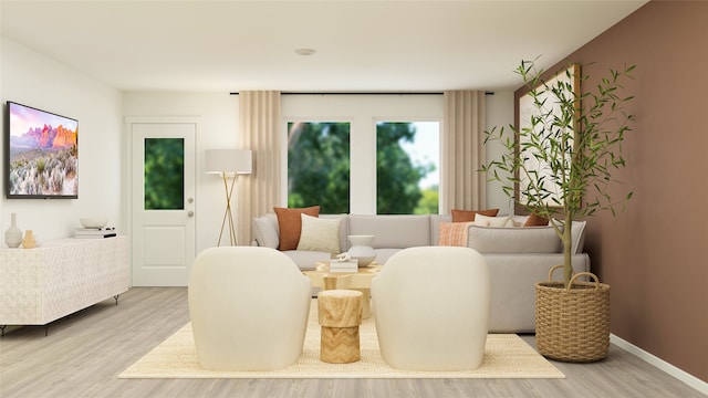 interior space with wood finished floors and baseboards