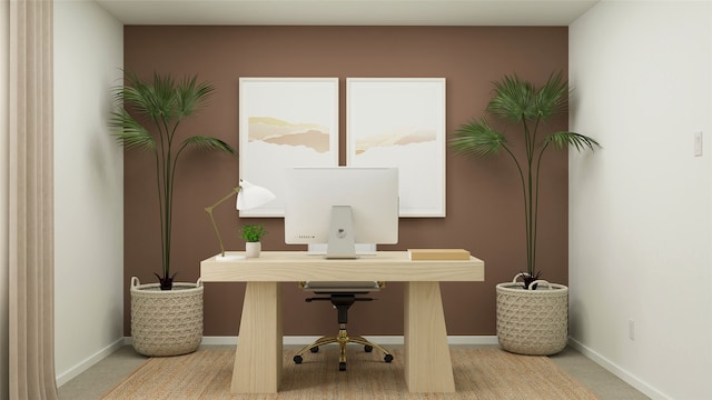 home office with baseboards and carpet