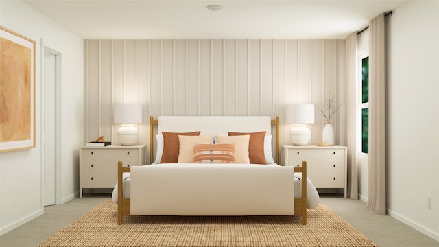 carpeted bedroom featuring baseboards
