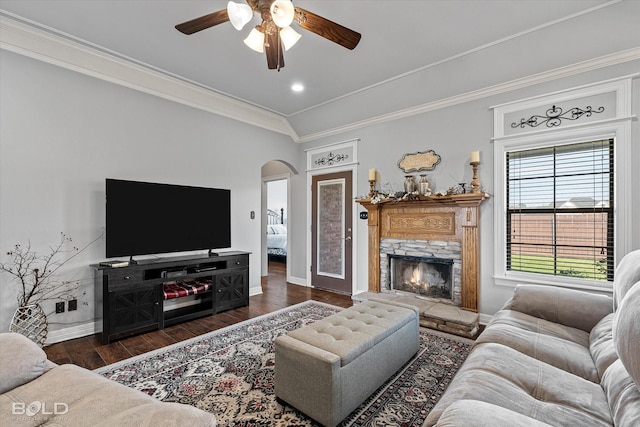 140 Fitzwilliam St, Haughton, LA 71037 - living area with ceiling fan, arched walkways, baseboards, ornamental molding, and wood finished floors