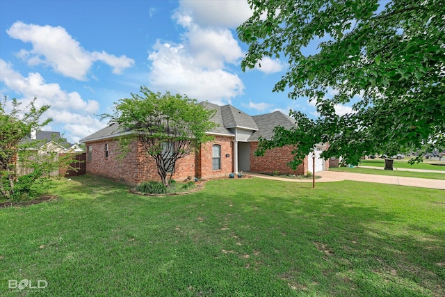 140 Fitzwilliam St, Haughton, LA 71037 - ranch-style house featuring brick siding, fence, a front lawn, and concrete driveway