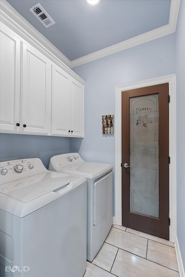 140 Fitzwilliam St, Haughton, LA 71037 - laundry room with cabinet space, washing machine and clothes dryer, ornamental molding, baseboards, and visible vents