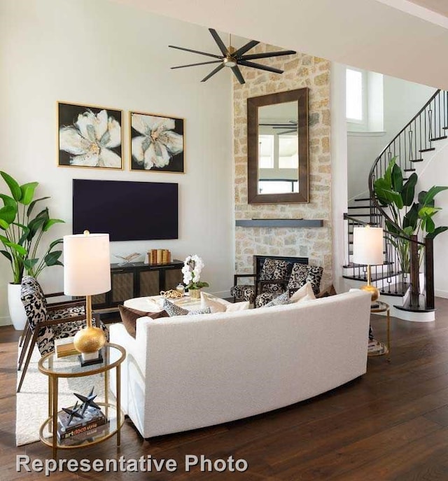 14509 Capridge Rd, Aledo, TX 76008 - living area with stairway, a ceiling fan, a fireplace, wood-type flooring, and lofted ceiling