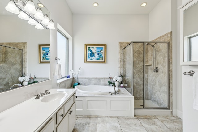 bathroom with recessed lighting, a shower stall, tile patterned floors, vanity, and a bath