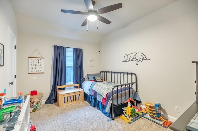bedroom with lofted ceiling, baseboards, carpet floors, and ceiling fan
