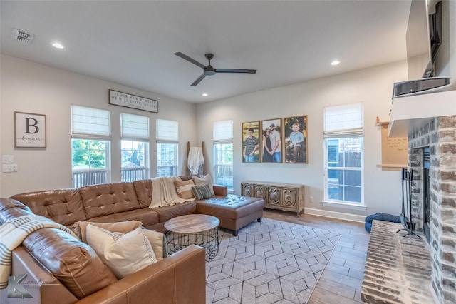 living room with recessed lighting, wood finished floors, and ceiling fan