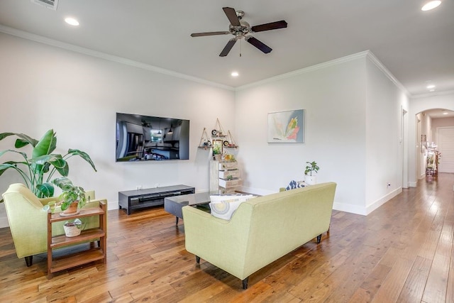 1833 Crested Ridge Rd, Fort Worth, TX 76008 - living area with crown molding, ceiling fan, wood-type flooring, and arched walkways