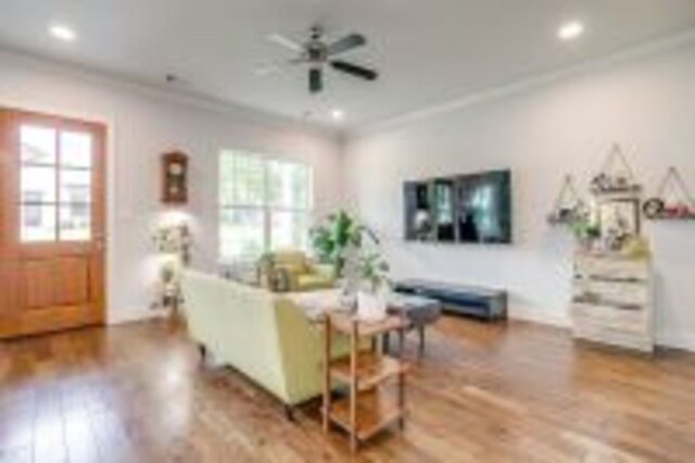 1833 Crested Ridge Rd, Fort Worth, TX 76008 - living room with crown molding, ceiling fan, plenty of natural light, and wood finished floors