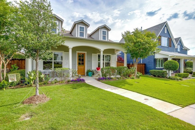 1833 Crested Ridge Rd, Fort Worth, TX 76008 - view of front of house with a front yard, covered porch, and fence