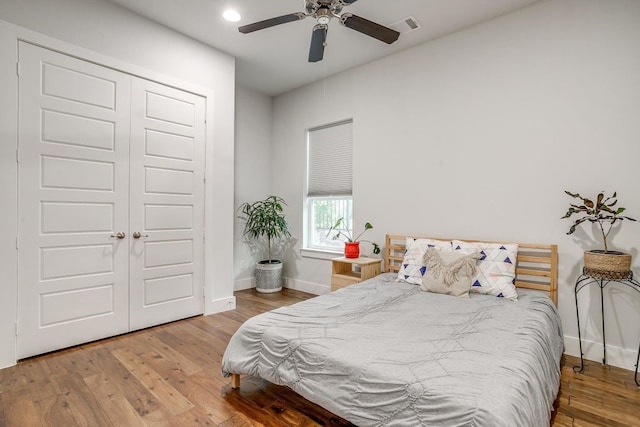 1833 Crested Ridge Rd, Fort Worth, TX 76008 - bedroom with baseboards, hardwood / wood-style floors, visible vents, and a closet
