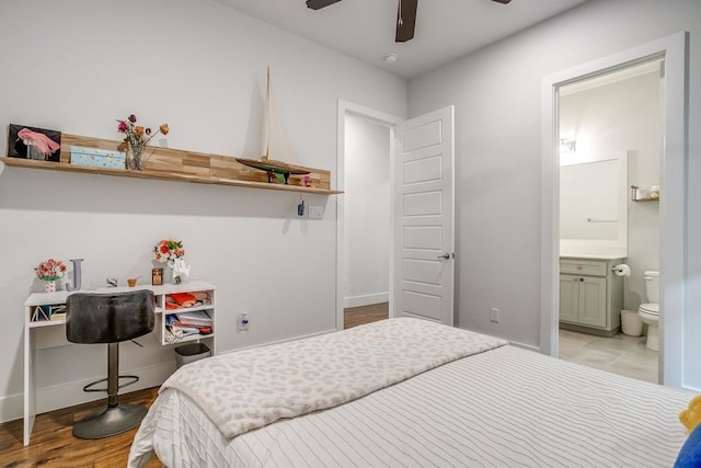 1833 Crested Ridge Rd, Fort Worth, TX 76008 - bedroom with ceiling fan, connected bathroom, and baseboards