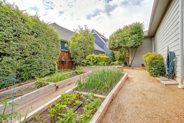 1833 Crested Ridge Rd, Fort Worth, TX 76008 - view of yard featuring fence and a vegetable garden