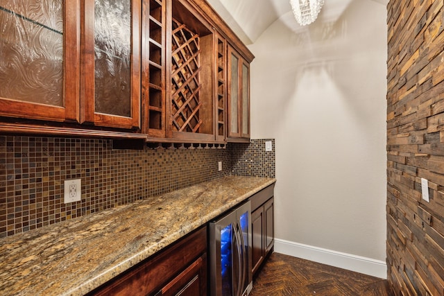 4161 San Juan Ave, Prosper, TX 75078 - bar with beverage cooler, vaulted ceiling, a bar, baseboards, and tasteful backsplash