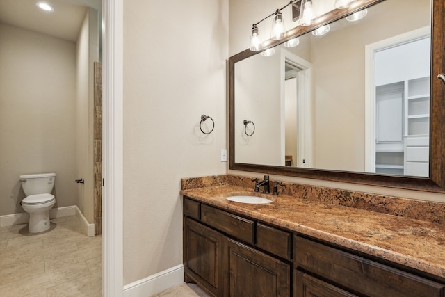 4161 San Juan Ave, Prosper, TX 75078 - bathroom featuring vanity, toilet, baseboards, and tile patterned floors
