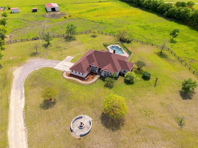 birds eye view of property featuring a rural view