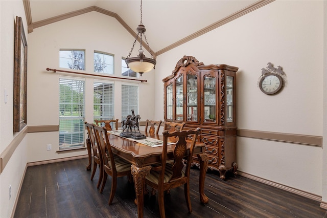 dining space featuring lofted ceiling, dark wood-style flooring, and crown molding
