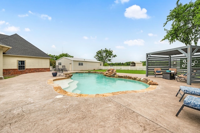 view of pool with a patio area, a fenced in pool, outdoor dining space, and fence