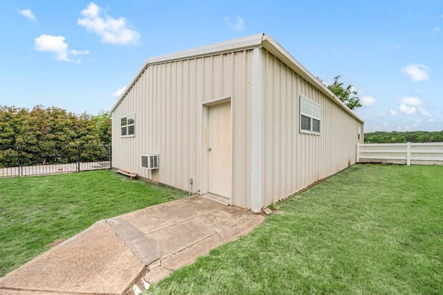 view of outdoor structure featuring a fenced backyard
