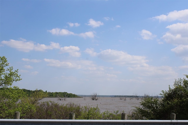 view of water feature with a rural view