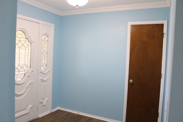 entrance foyer with baseboards, crown molding, and dark wood-style floors