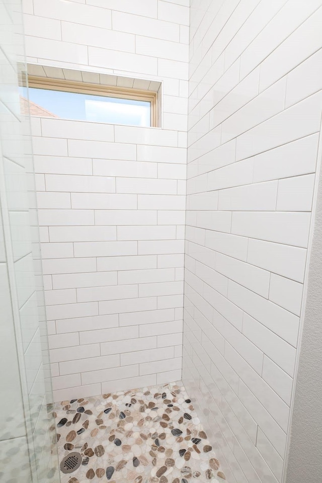 bathroom featuring a stall shower