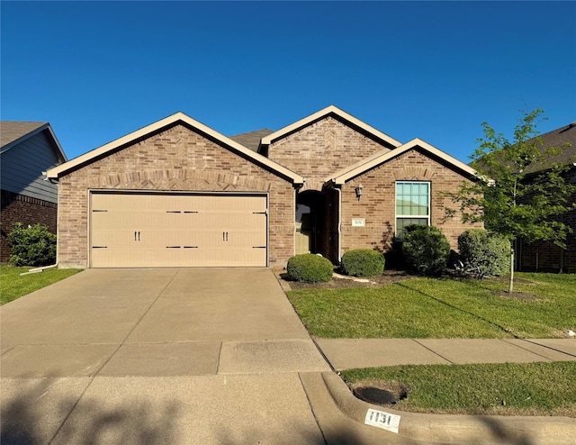 1131 Grimes Dr, Forney, TX 75126 - ranch-style house with a garage, concrete driveway, a front lawn, and brick siding