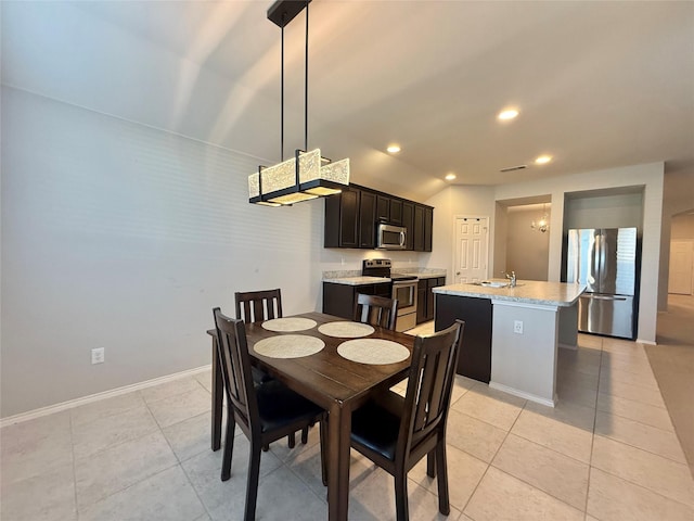 1131 Grimes Dr, Forney, TX 75126 - dining area with light tile patterned floors and recessed lighting