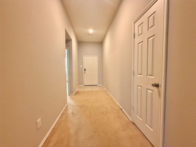 1131 Grimes Dr, Forney, TX 75126 - hallway with light colored carpet and baseboards