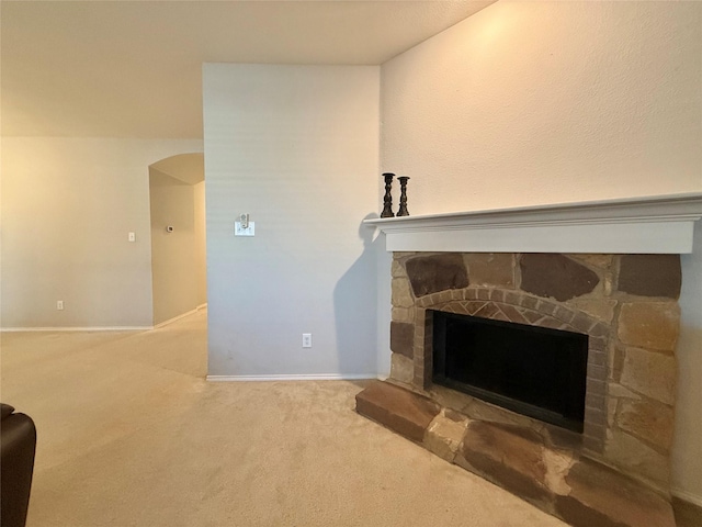 1131 Grimes Dr, Forney, TX 75126 - detailed view of a stone fireplace and carpet flooring