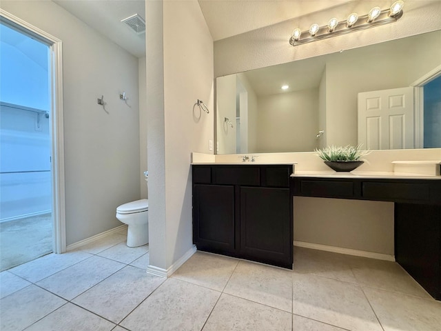 1131 Grimes Dr, Forney, TX 75126 - bathroom with double vanity and tile patterned flooring