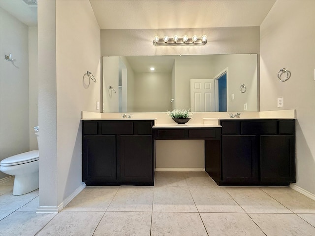 1131 Grimes Dr, Forney, TX 75126 - bathroom featuring double vanity and tile patterned floors