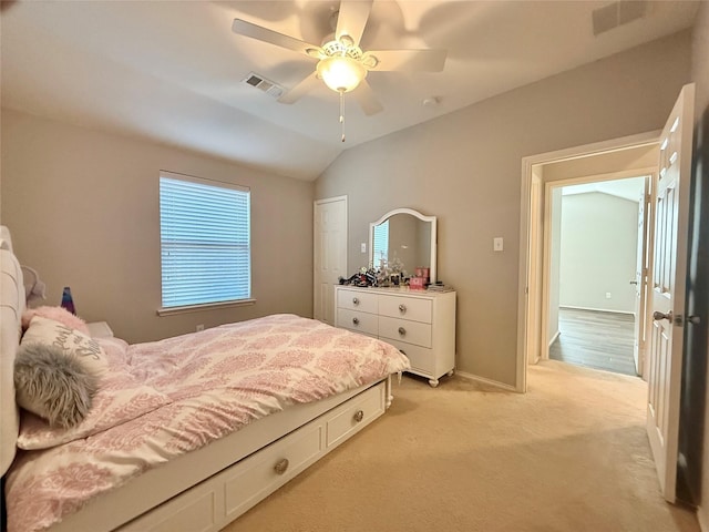 1131 Grimes Dr, Forney, TX 75126 - bedroom featuring light carpet, lofted ceiling, and ceiling fan