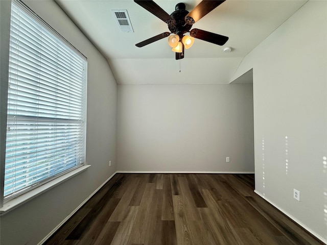 1131 Grimes Dr, Forney, TX 75126 - unfurnished room featuring vaulted ceiling, wood finished floors, a smoke detector, and ceiling fan