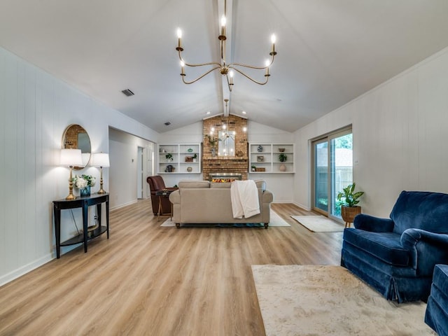 living room with visible vents, built in features, a chandelier, lofted ceiling, and wood finished floors