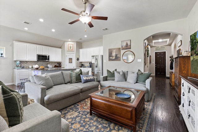 2452 Open Range Dr, Fort Worth, TX 76177 - living area with arched walkways, ceiling fan, dark wood-style flooring, recessed lighting, and baseboards