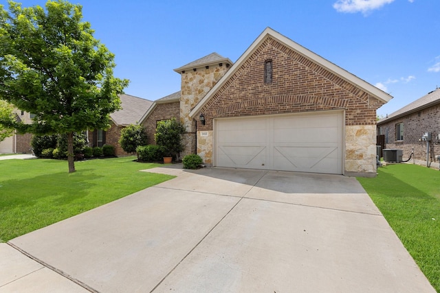 2452 Open Range Dr, Fort Worth, TX 76177 - view of front of house featuring stone siding, driveway, a garage, and a front lawn