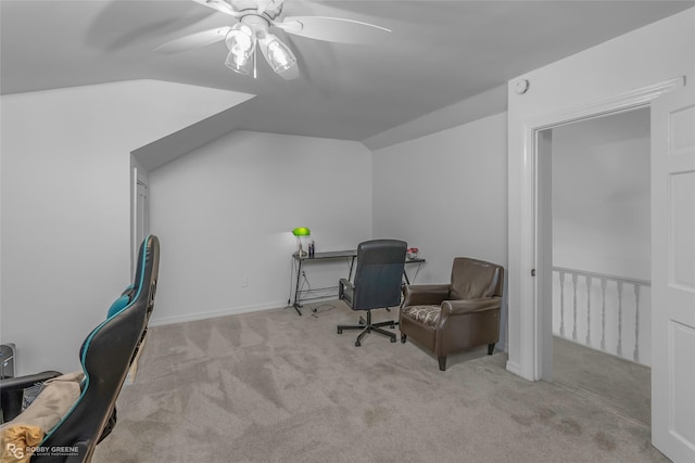 office space featuring carpet, a ceiling fan, and lofted ceiling