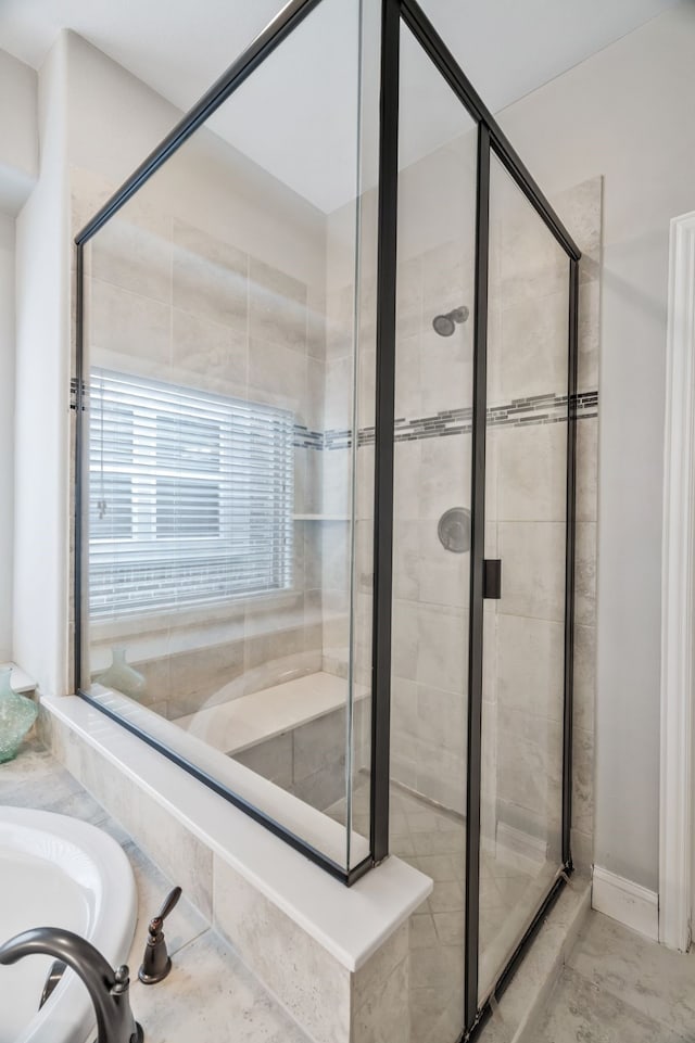 bathroom with a shower stall