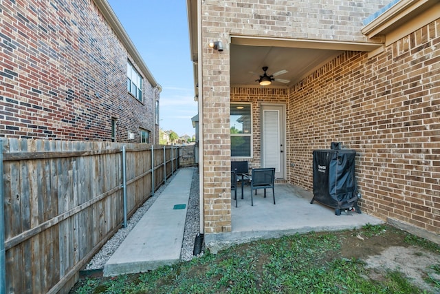 view of patio / terrace featuring ceiling fan and a fenced backyard