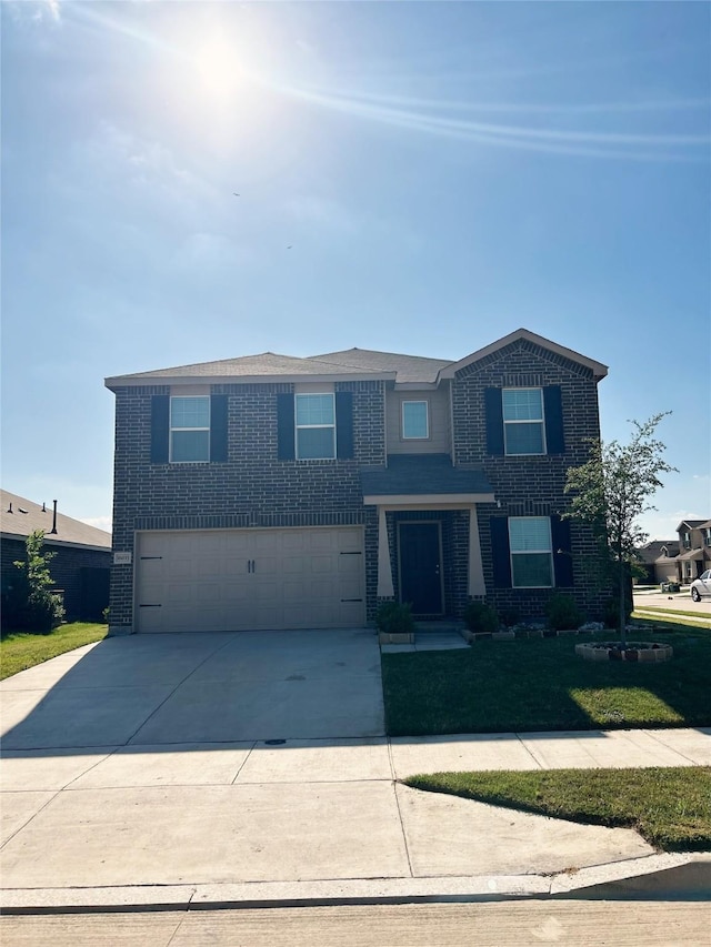 16033 Rein Ave, Haslet, TX 76052 - traditional-style house with concrete driveway, a front lawn, brick siding, and a garage