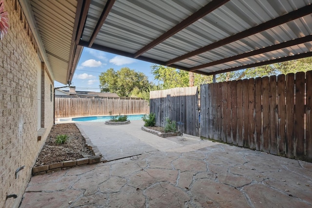 3141 La Kenta Cir, Farmers Branch, TX 75234 - view of patio featuring a fenced backyard