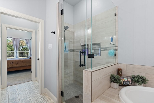 1295 County Road 2030, Glen Rose, TX 76043 - bathroom featuring ensuite bathroom, a shower stall, a garden tub, and tile patterned flooring