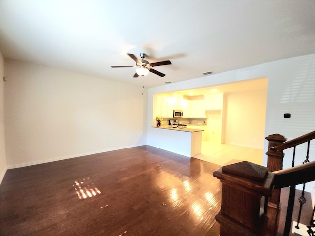 4223 Cascade Sky Dr, Arlington, TX 76005 - unfurnished living room featuring visible vents, wood finished floors, and ceiling fan