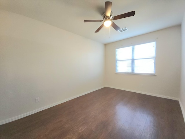 4223 Cascade Sky Dr, Arlington, TX 76005 - spare room with visible vents, ceiling fan, dark wood-style flooring, and baseboards