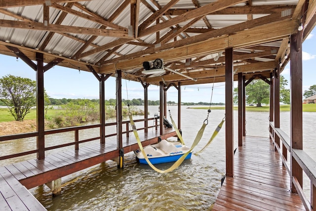 dock area featuring a water view and boat lift