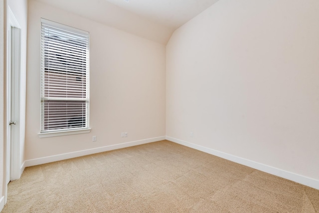 2316 Miranda Ln, Rockwall, TX 75087 - carpeted empty room featuring baseboards and lofted ceiling