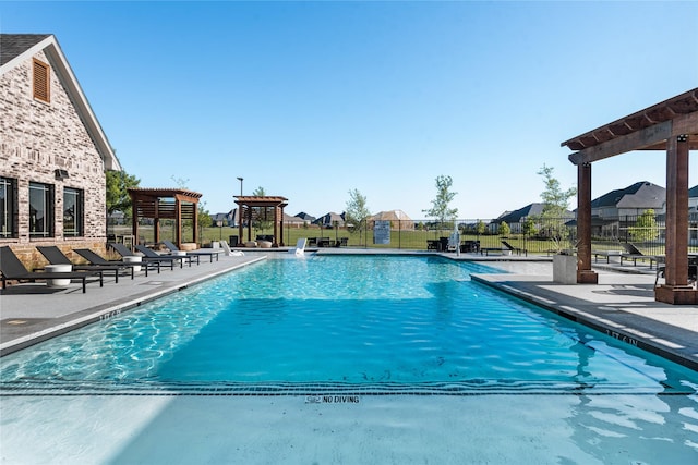 2316 Miranda Ln, Rockwall, TX 75087 - community pool with a pergola and a patio area